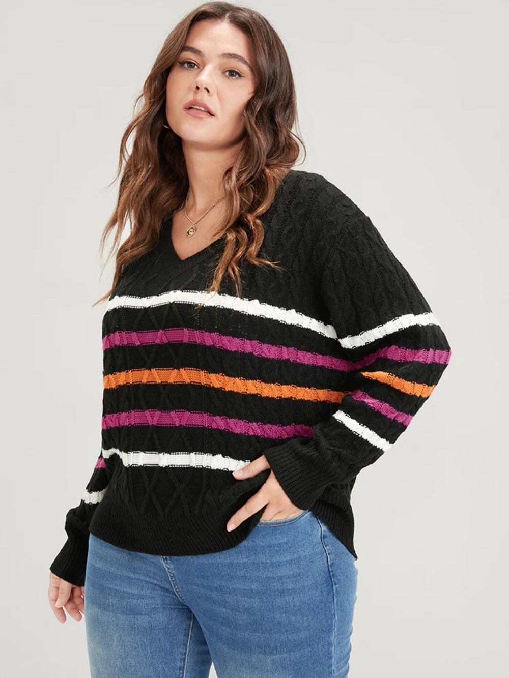 Cable knit sweater with accent stripes
